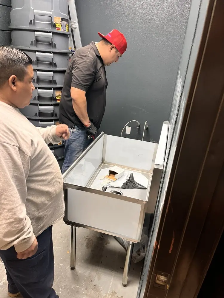 Commercial plumbing and sink installation in Quincy